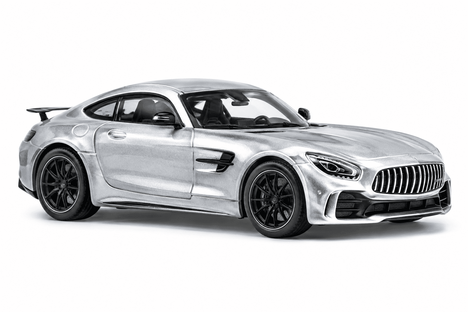 Silver grand tourer diecast car on white